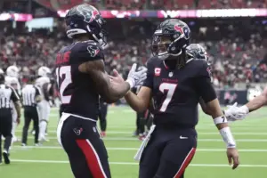Cowboys vs Texans preview: Texans quarterback C.J. Stroud celebrates with receiver Nico Collins