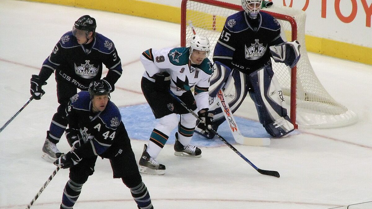Kings vs Sharks preview photo of Los Angeles Kings and San Jose Sharks players in front of the net