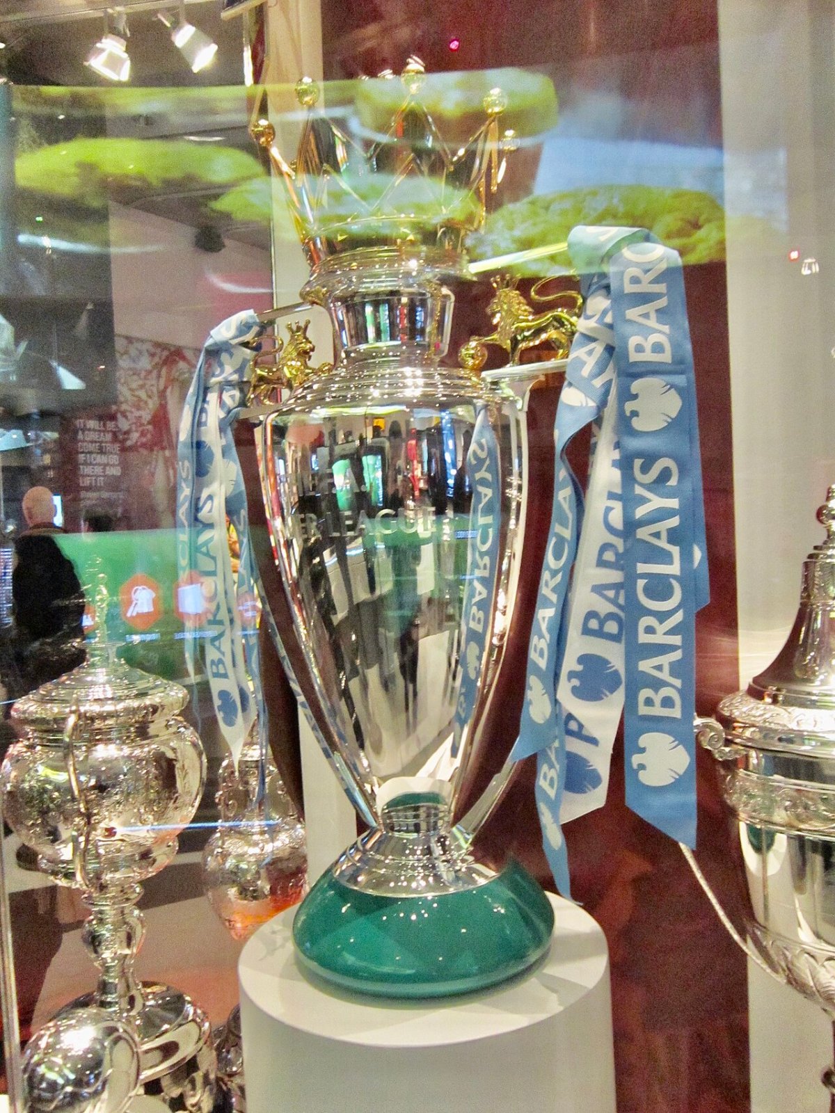 The Premier League trophy on display in Manchester; lost titles and bonuses are at the heart of Man City compensation claims